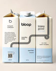 Image of Care Free Natural Laundry Soap. Both side views and front view. 32 ounces. Information about Bloop's mission and QR code.