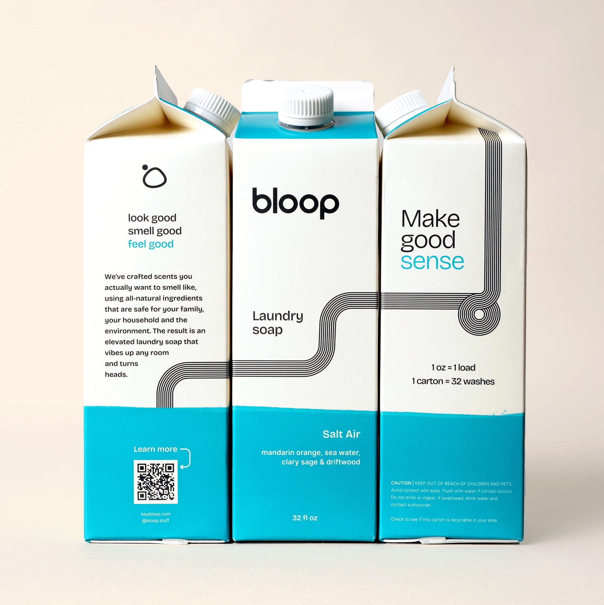 Image of Salt Air Natural Laundry Soap. Both side views and front view. 32 ounces. Information about Bloop's mission and QR code.