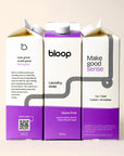Image of Stone Fruit Natural Laundry Soap. Both side views and front view. 32 ounces. Information about Bloop's mission and QR code.