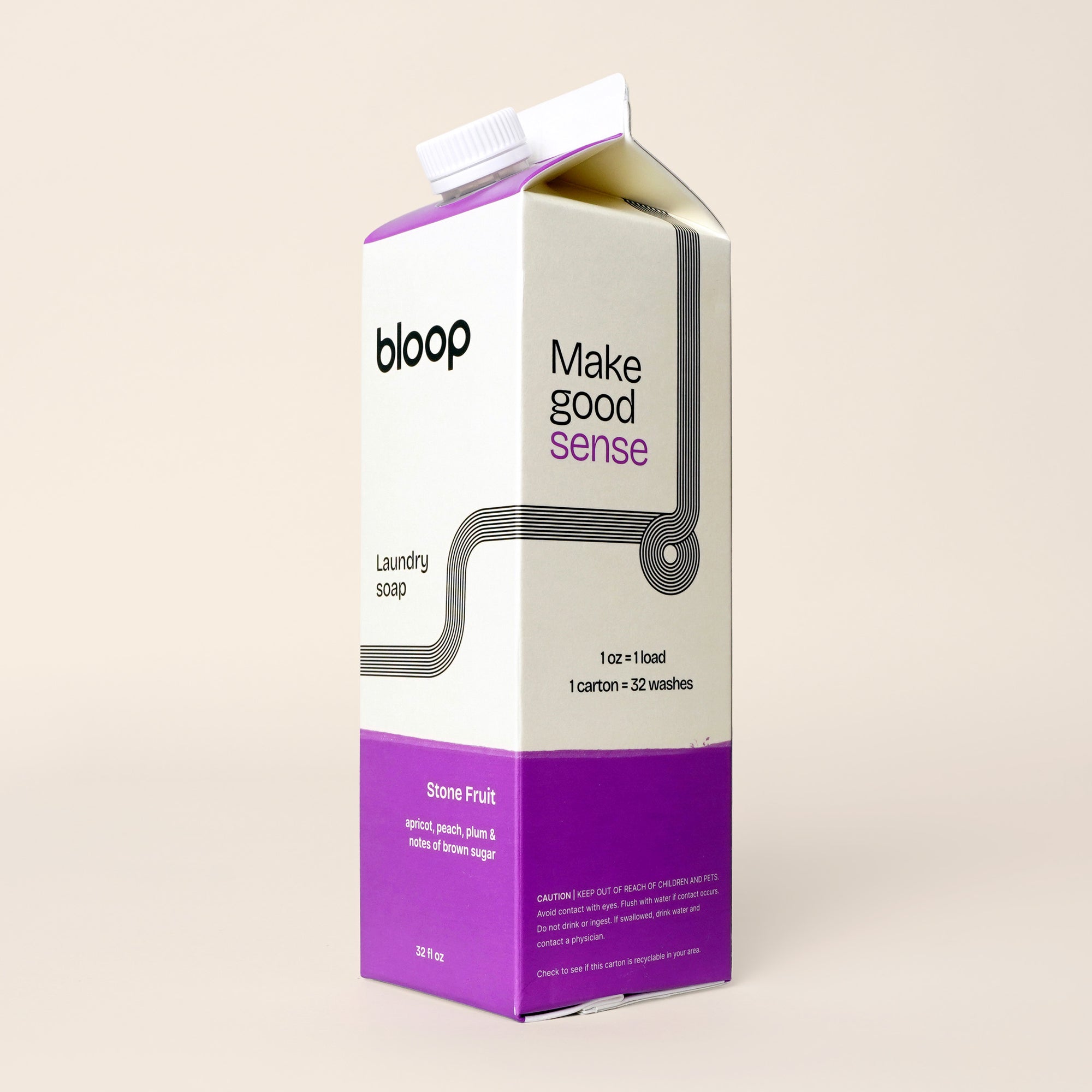 Angled View of front and side view of Stone Fruit Natural Laundry Soap. 32 ounces, plastic-free and environmentally friendly.