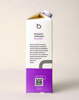 Side View of Stone Fruit Concentrated Laundry Soap. 32 ounces, plastic-free. Information about Bloop's mission with QR code.