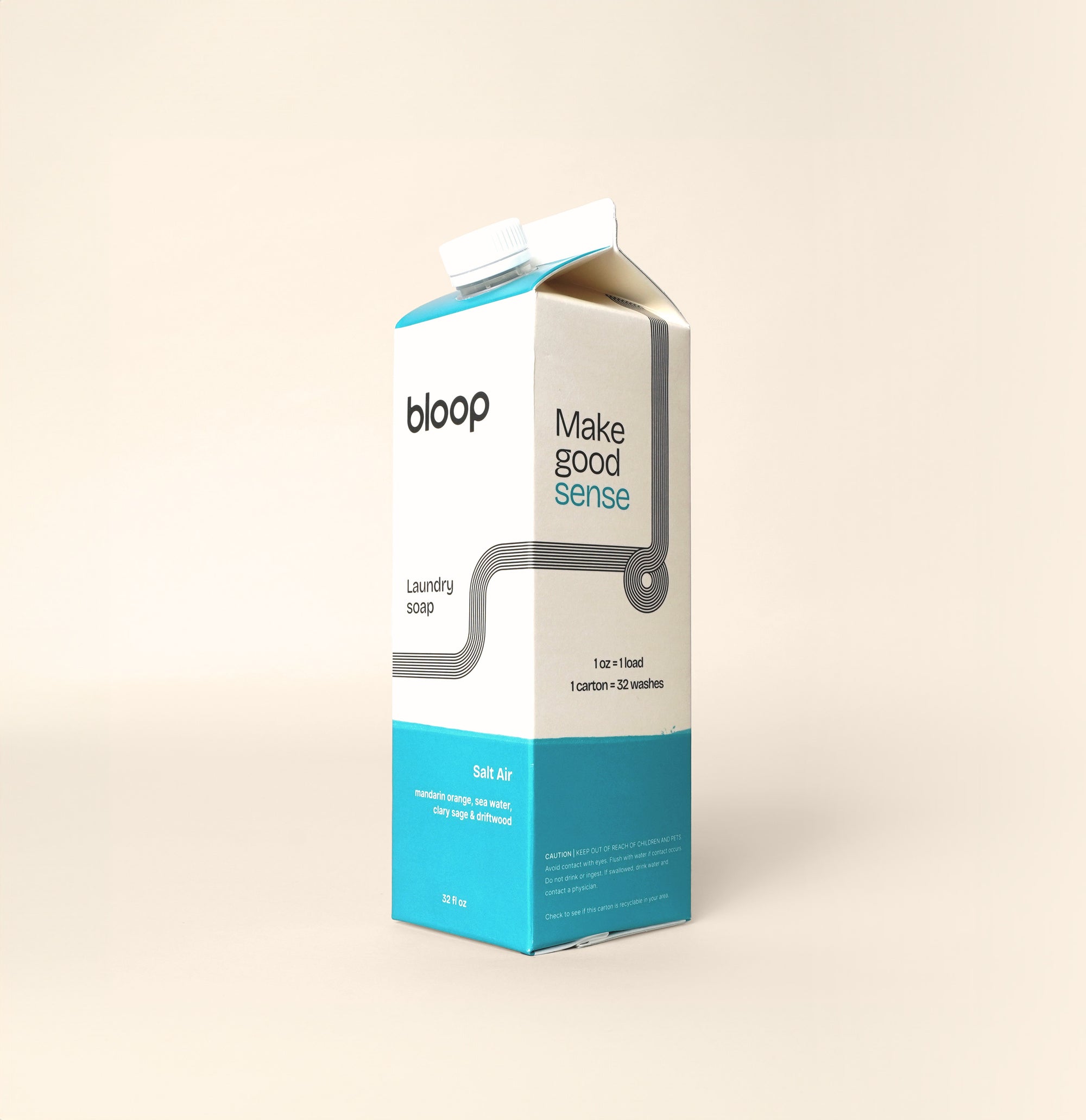 Angled View of front and side view of Salt Air Concentrated Laundry Soap. 32 ounces, plastic-free and environmentally friendly.